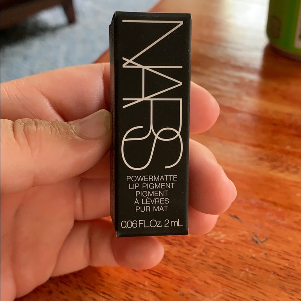 NARS lip pigment in American woman